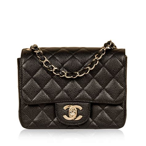 chanel in the business flap black leather shoulder bag|Chanel Classic Flap Bag: How Much Is It & Is It Worth It .